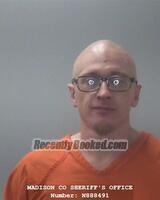 Booking photo from Madison County, Alabama