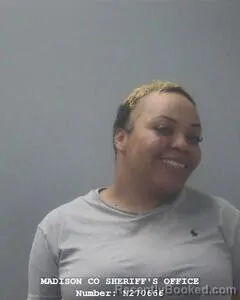 Mugshot of DOMINIQUE T BLACKBURN booked in Madison County, Alabama on April 17, 2026