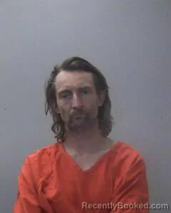 Mugshot of JONATHAN B COOPER booked in Madison County, Alabama on June 8, 2026