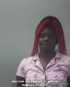 Mugshot of LYTALIA T HYTER booked in Madison County, Alabama on April 16, 2026