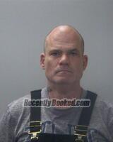 Booking photo from Madison County, Alabama