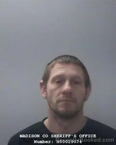 Mugshot of JOSHUA L COWSERT