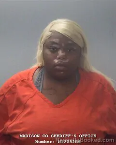 Mugshot of Laquisha D Burton booked in Madison County, Alabama on October 12, 2026