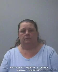 Mugshot of KIM D PAGE booked in Madison County, Alabama on March 27, 2026