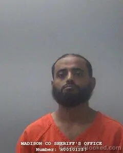Mugshot of Anwar A Alqassari booked in Madison County, Alabama on August 12, 2026