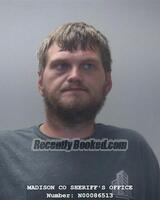 Booking photo from Madison County, Alabama