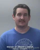 Booking photo from Madison County, Alabama