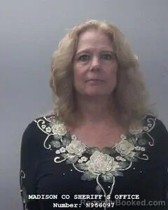 Mugshot of APRIL D ALHAMDAN booked in Madison County, Alabama on June 12, 2026
