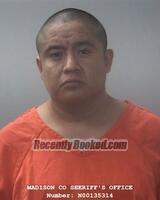 Booking photo from Madison County, Alabama