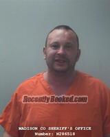 Booking photo from Madison County, Alabama