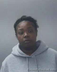 Mugshot of MISCHA A WHIGHAM