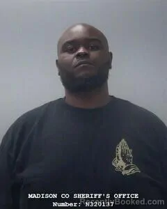 Mugshot of FRANKLIN D MOORE booked in Madison County, Alabama on March 27, 2026