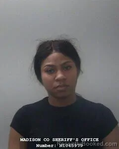 Mugshot of AMANDA R HARPER-ROBINSON booked in Madison County, Alabama on March 30, 2026