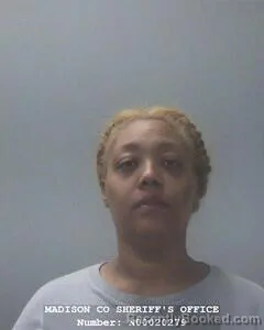 Mugshot of BRANDI C ARMSTRONG-WALKER booked in Madison County, Alabama on April 6, 2026