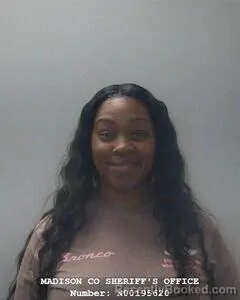 Mugshot of JAQUETTA R GLOVER booked in Madison County, Alabama on April 17, 2026