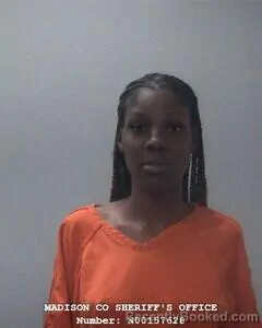 Mugshot of TNIESHA J PERRY booked in Madison County, Alabama on June 9, 2026