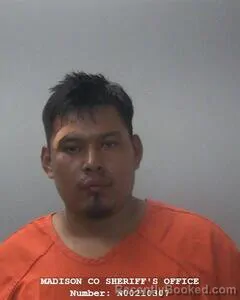 Mugshot of Santiago Mejia Reyes booked in Madison County, Alabama on August 2, 2026