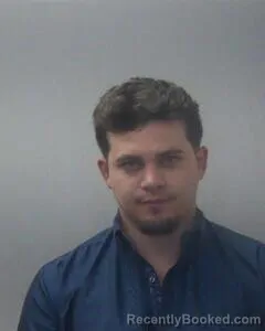 Mugshot of Cameron J Barton booked in Madison County, Alabama on August 9, 2026