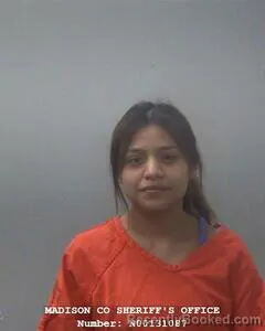 Mugshot of Johana Lizeth Leon Cisca booked in Madison County, Alabama on August 11, 2026