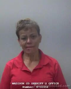 Mugshot of Rosa E Gonzalez-Demartinez booked in Madison County, Alabama on August 24, 2026