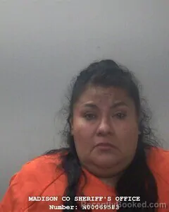 Mugshot of Benigna M Garcia booked in Madison County, Alabama on September 28, 2026