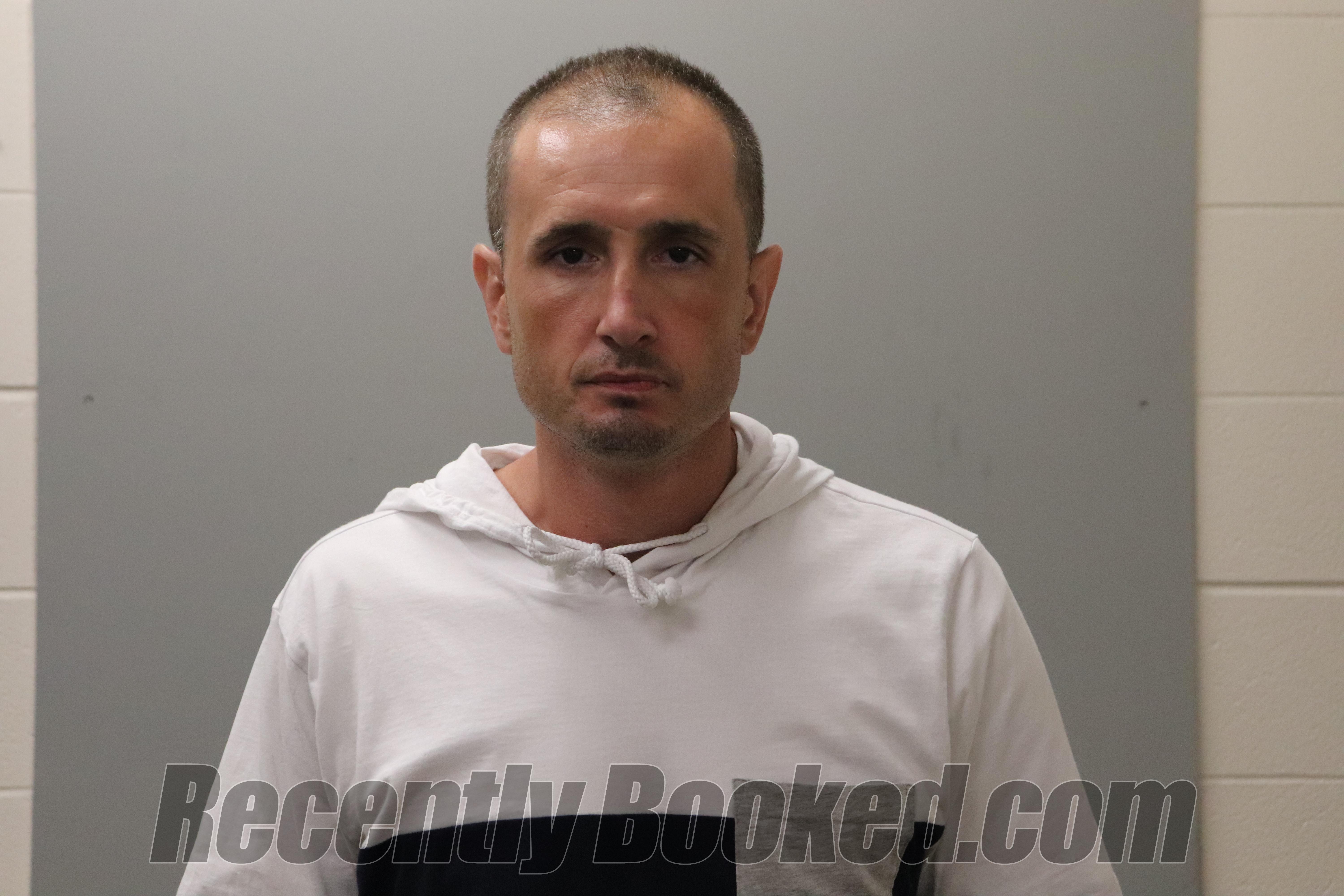 Booking photo from Madison County, Alabama