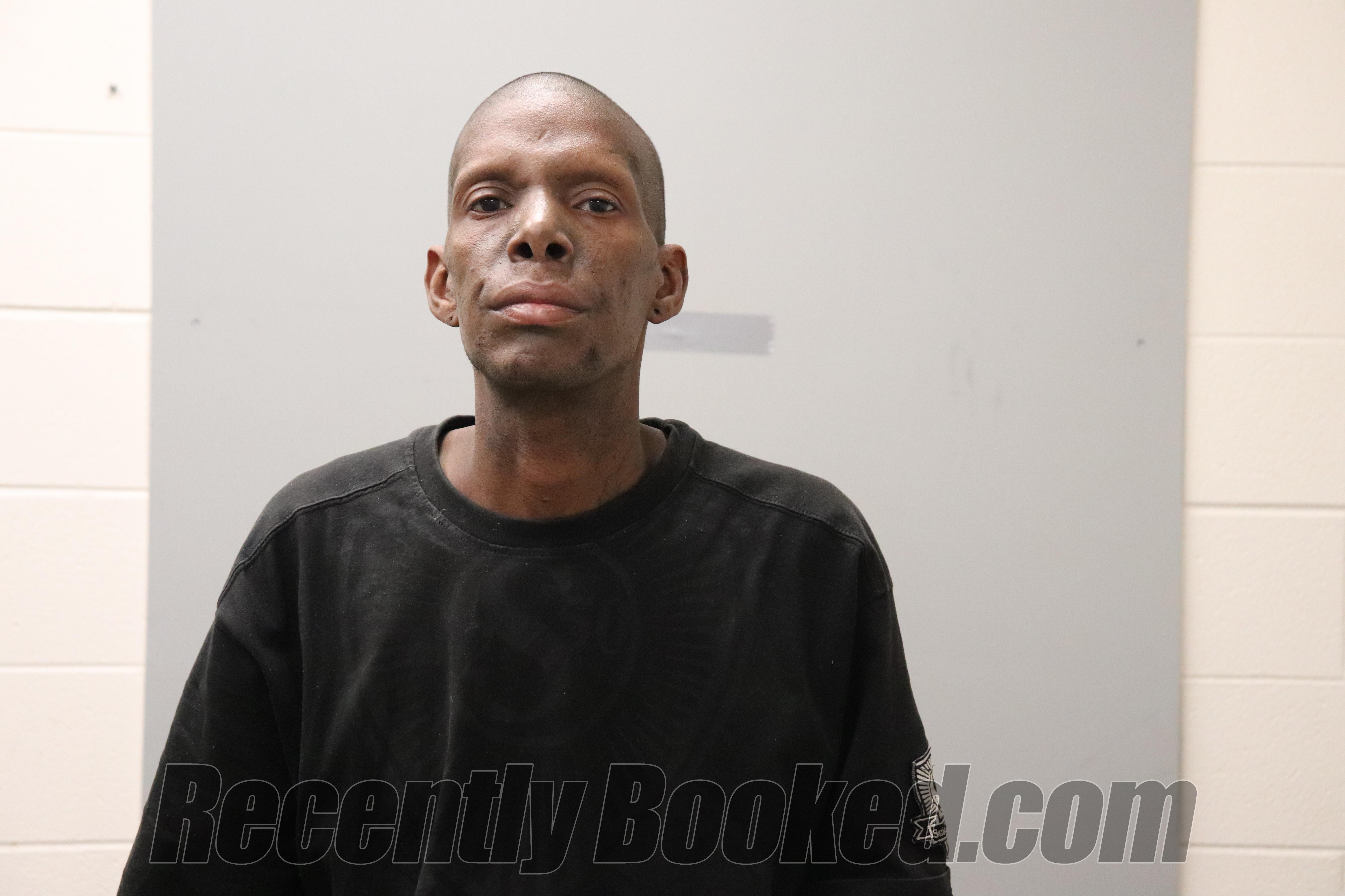 Booking photo from Madison County, Alabama