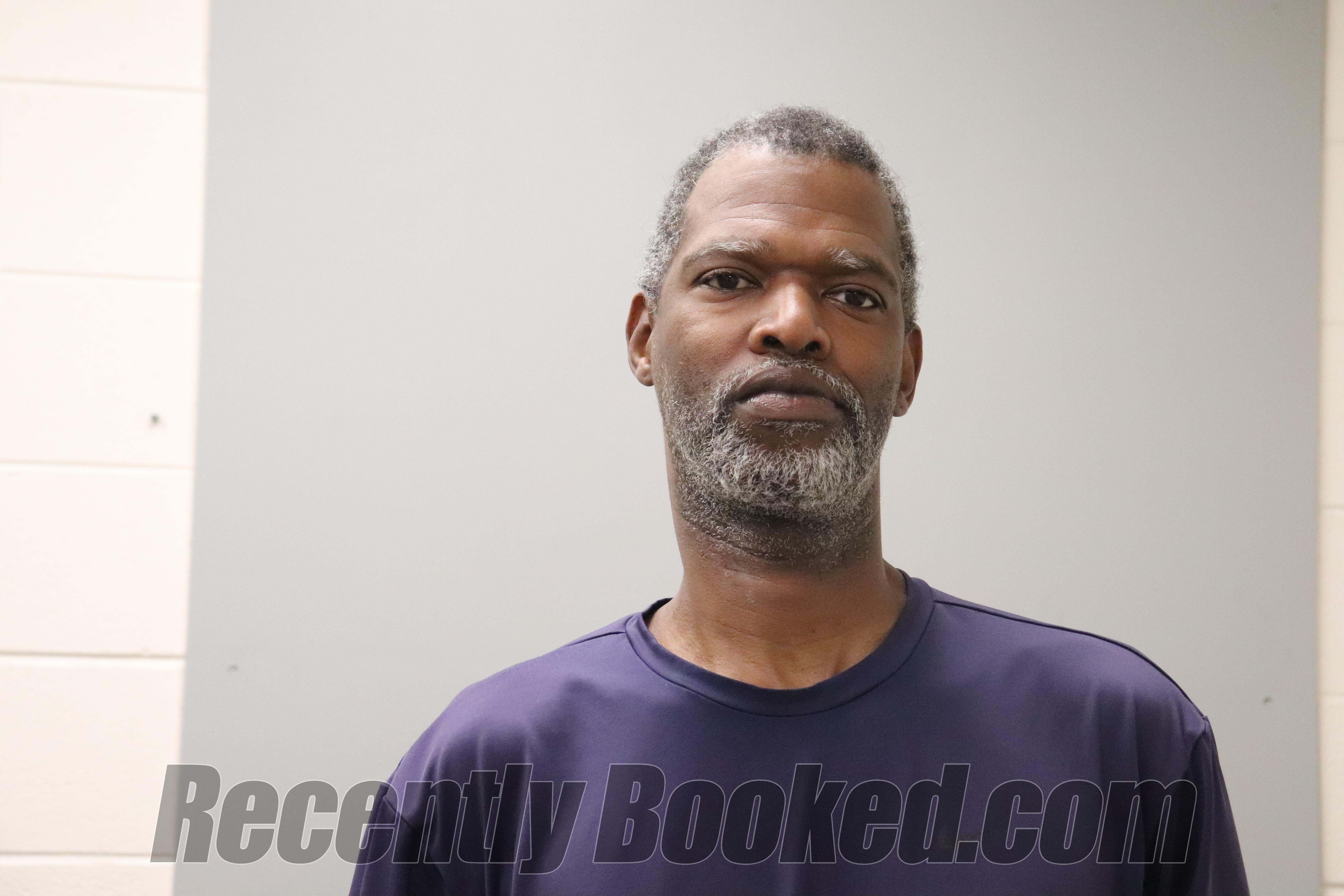 Booking photo from Madison County, Alabama