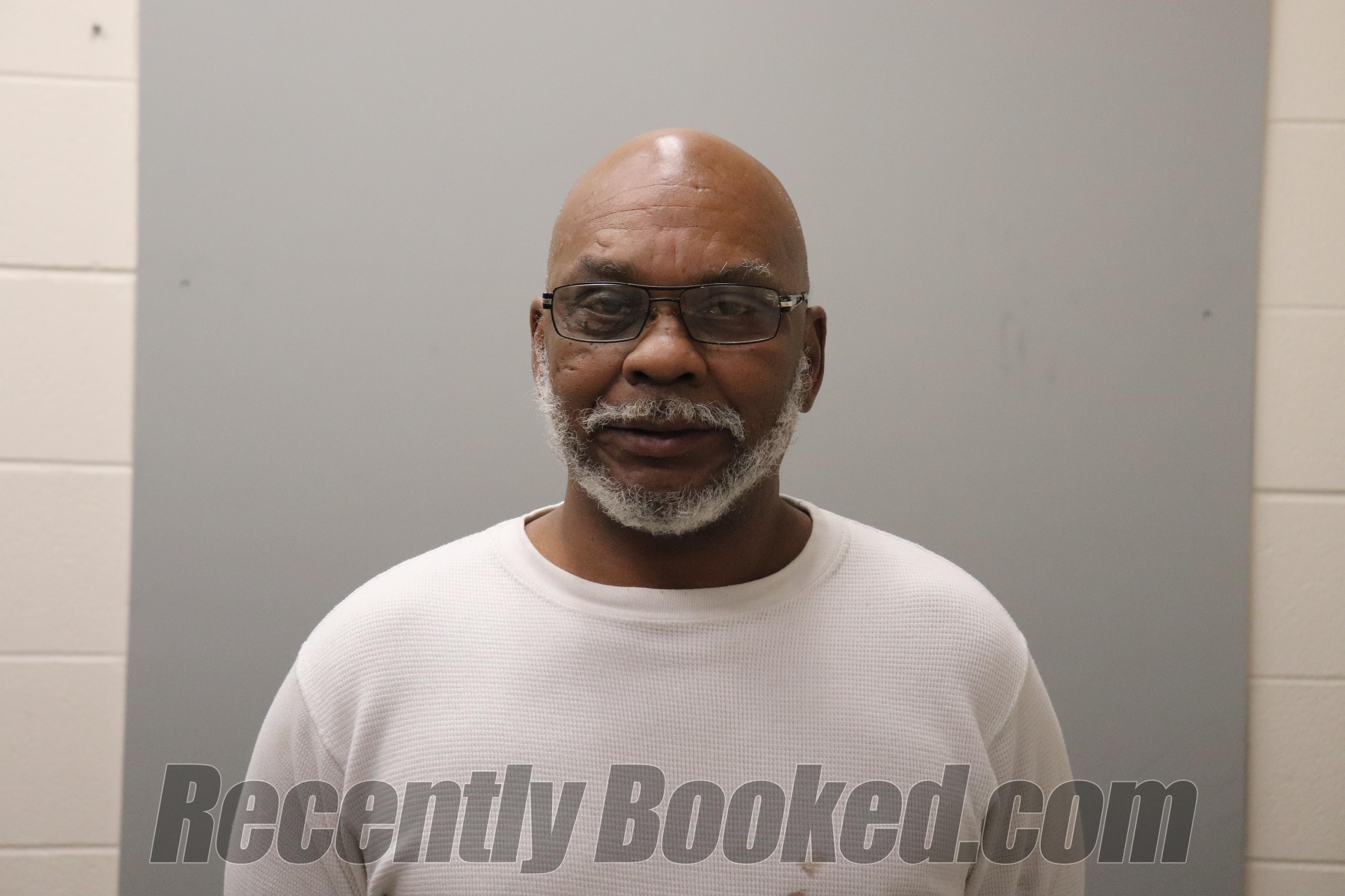 Booking photo from Madison County, Alabama