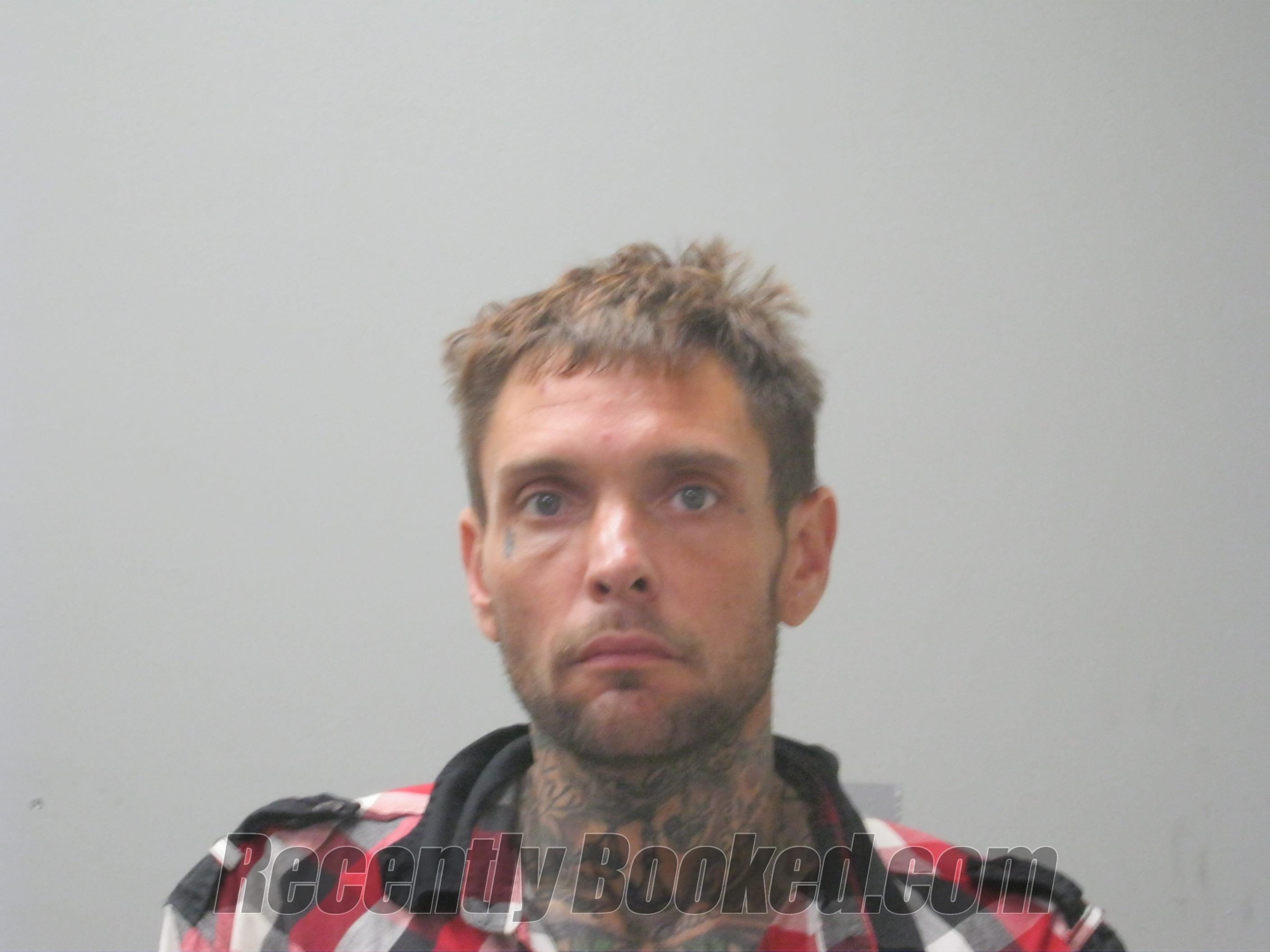 Booking photo from Madison County, Alabama