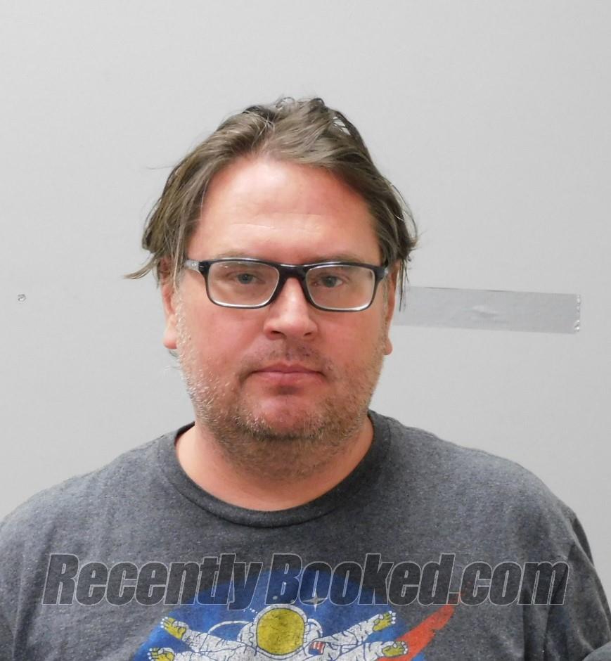 Booking photo from Madison County, Alabama