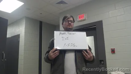 Mugshot of MICHAEL MOORE