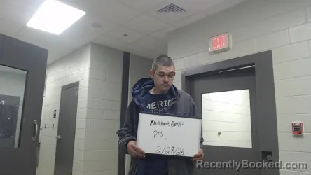 Mugshot of GARRETT RHINEHEART