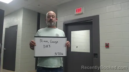 Mugshot of GEORGE W MIXON