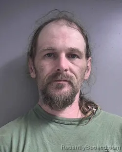 Mugshot of TRAVIS MATTHEW NEWMAN