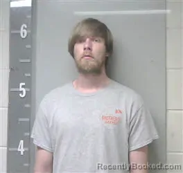 Mugshot of JUSTIN BROCK MULLINAX booked in Marshall County, Alabama on April 22, 2026