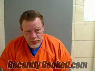 Booking photo from Monroe County, Alabama