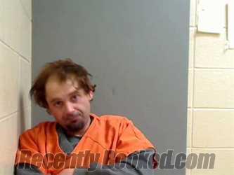 Booking photo from Monroe County, Alabama