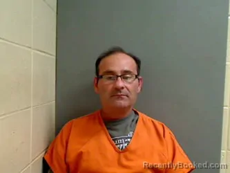 Booking photo from Monroe County, Alabama