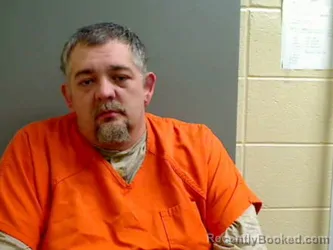 Booking photo from Monroe County, Alabama