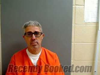 Booking photo from Monroe County, Alabama