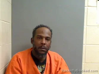 Booking photo from Monroe County, Alabama