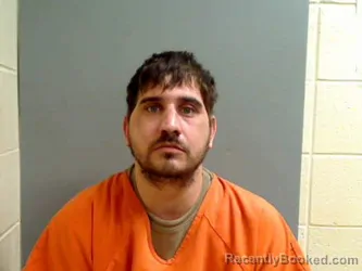 Booking photo from Monroe County, Alabama