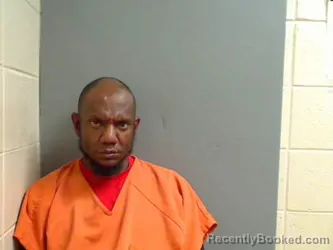 Booking photo from Monroe County, Alabama