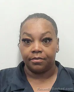 Mugshot of ALECIA MONSHA JOHNSON booked in Montgomery County, Alabama on April 15, 2026
