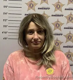Mugshot of KRISTINA JORDAN JOHNSON booked in Morgan County, Alabama on July 8, 2026