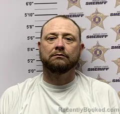 Mugshot of SPENCER EDWARD POLUDNIAK booked in Morgan County, Alabama on March 12, 2026