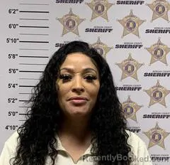 Mugshot of CRYSTAL DENISE AGUINAGA