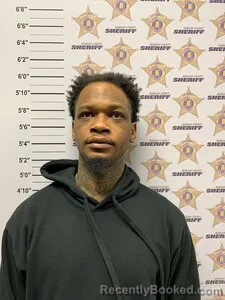 Mugshot of JUSTIN CORNELIUS MALONE booked in Morgan County, Alabama on March 18, 2026