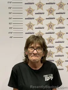 Mugshot of PENNY BORDEN COWART booked in Morgan County, Alabama on March 19, 2026